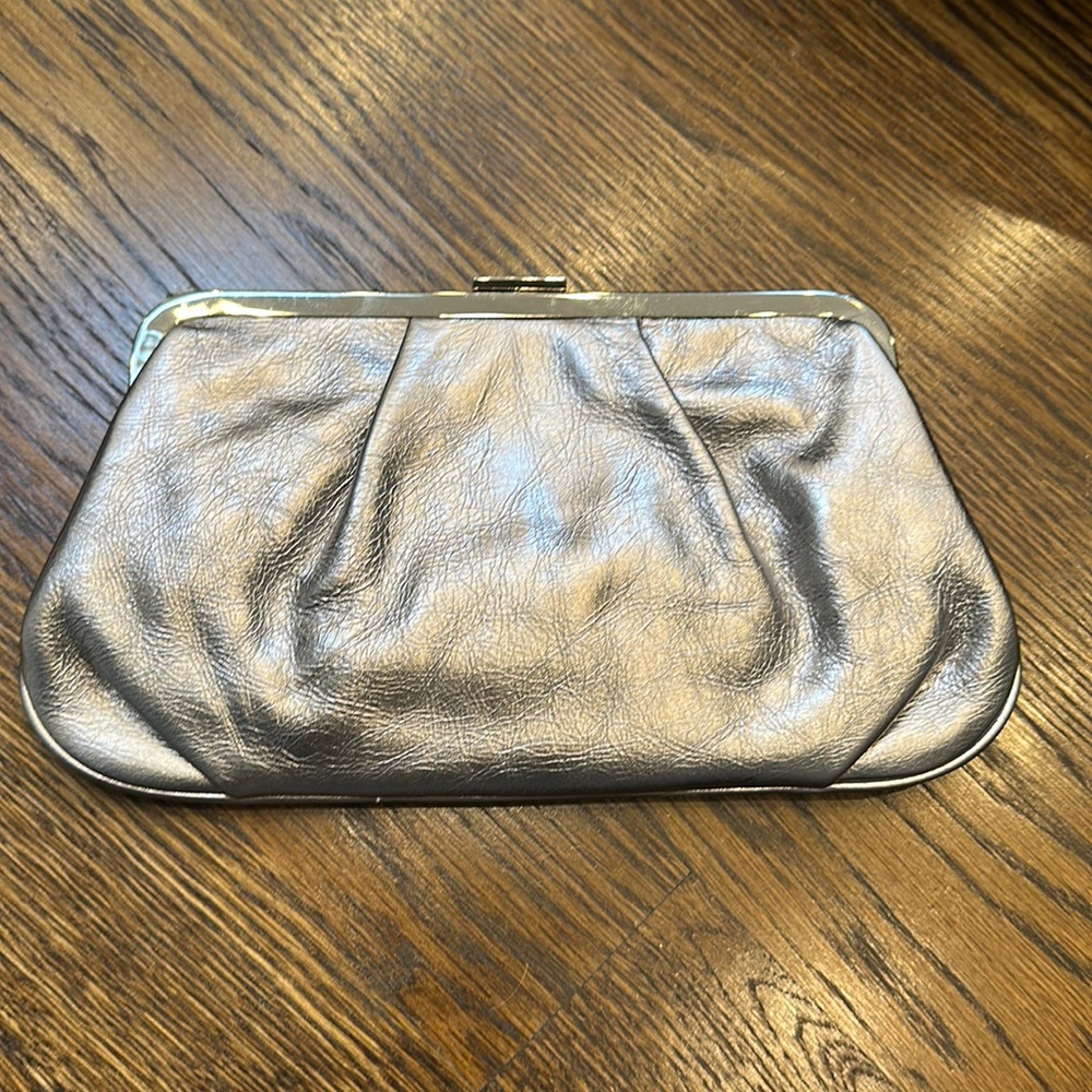 J crew clutch spots on back
